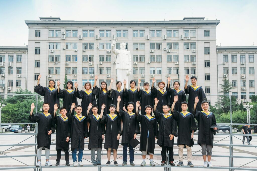 international students celebrating scholarship award on university campus 2025