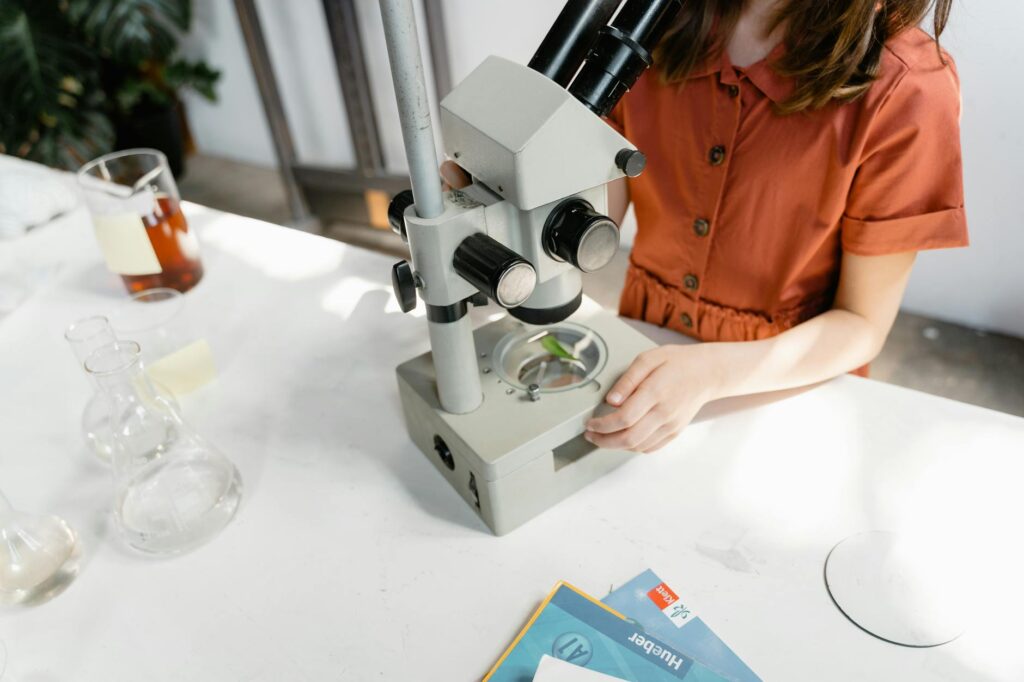 college student studying chemistry lab scholarship application