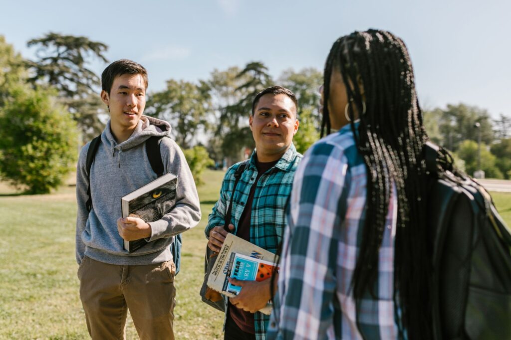 diverse group of scholarship recipients at an international university campus
